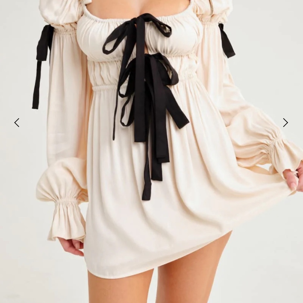 Rumored Cream Macbeth dress